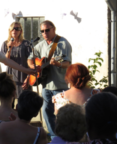 Sharing a song at a baptism in St. Cyr-Sur-Loire, France